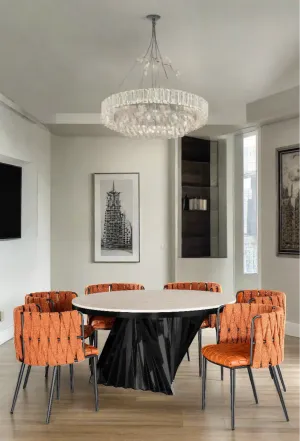 Waterfall Round Black Dining Set for 6 with Orange Chairs